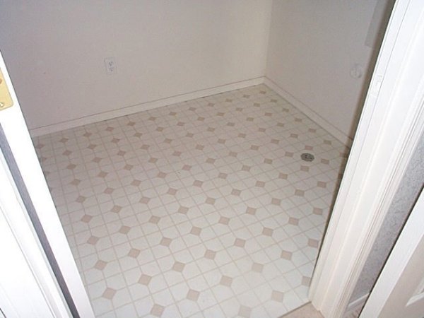 Laundry room / shelves on left side behind door